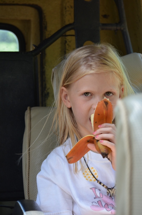 Caroline trying a local red banana - much sweeter and not as mushy as yellow.