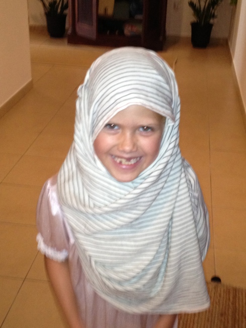 Caroline perfected her middle eastern head ware.