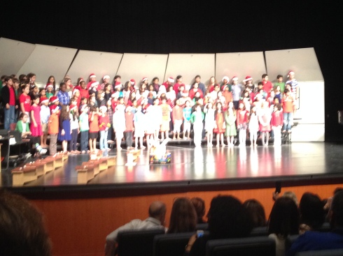 4th grade winter concert - Molly in black/silver striped dress and black tights 