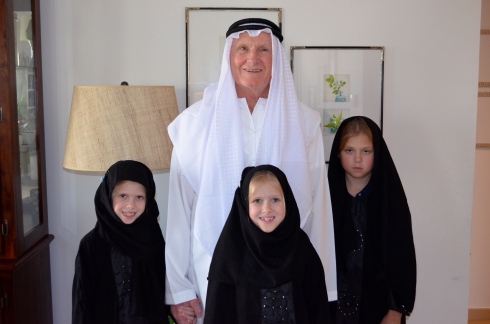 Dad in his dishdash, and girls in their abayas. I love this photo!