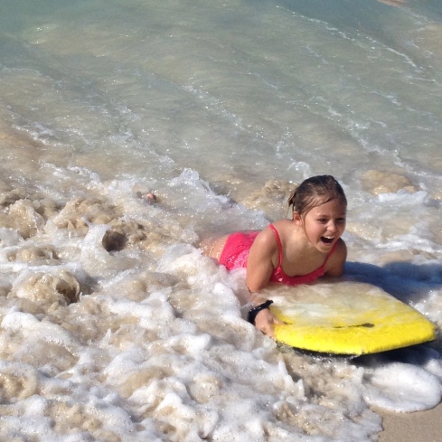 Molly has become an expert surfing the waves! Even when the water is COLD!