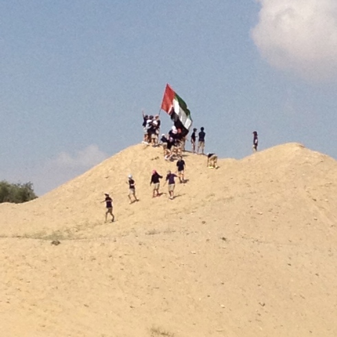 One of the tasks was for the class to run up the sand dune and retrieve the UAE flag.  It's much farther up than it looks!