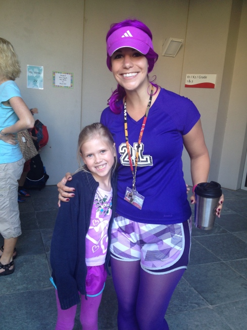 Caroline and her teacher, Mrs. Legg for field day.  Their team color was purple, if you couldn't tell.