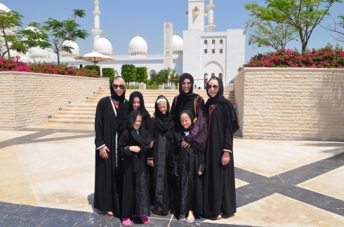 The girls in our abayas at the Sheik Zayed Grand Mosque in Abu Dhabi.